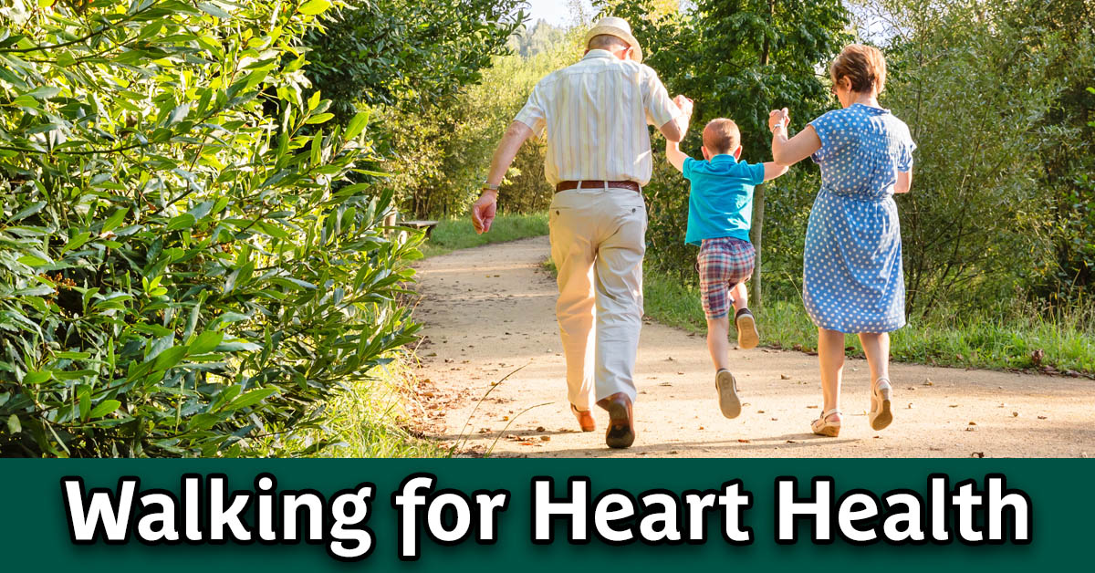 Walking for heart health. Senior couple taking a stroll with their grandchild.