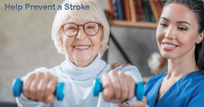 Help Prevent a Stroke. Picture of an elderly Caucasian woman exercising with guidance from a young hispanic female physical therapist.