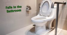Is the Bathroom the Most Dangerous Room in the House? Picture of a toilet in a bathroom with grab bars.