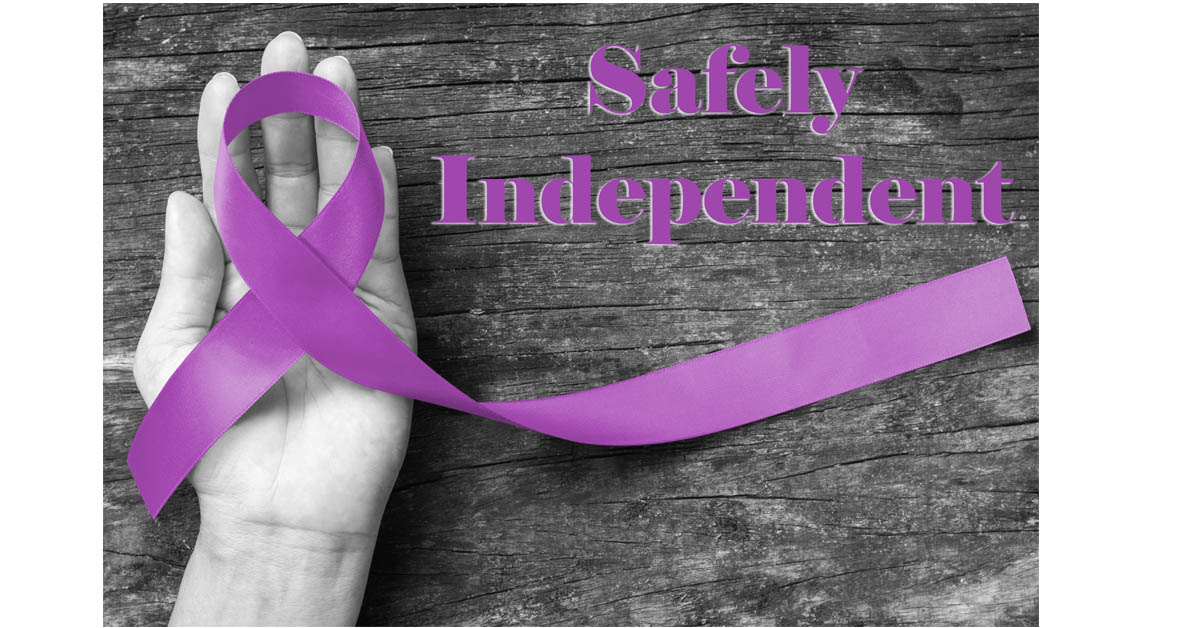 Safely Independent. Picture of a hand holding a purple ribbon.
