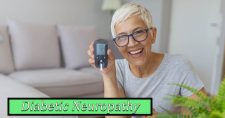 Lady holding a glucose meter