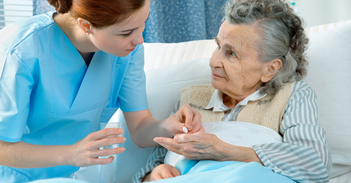 Nursing helping with medication